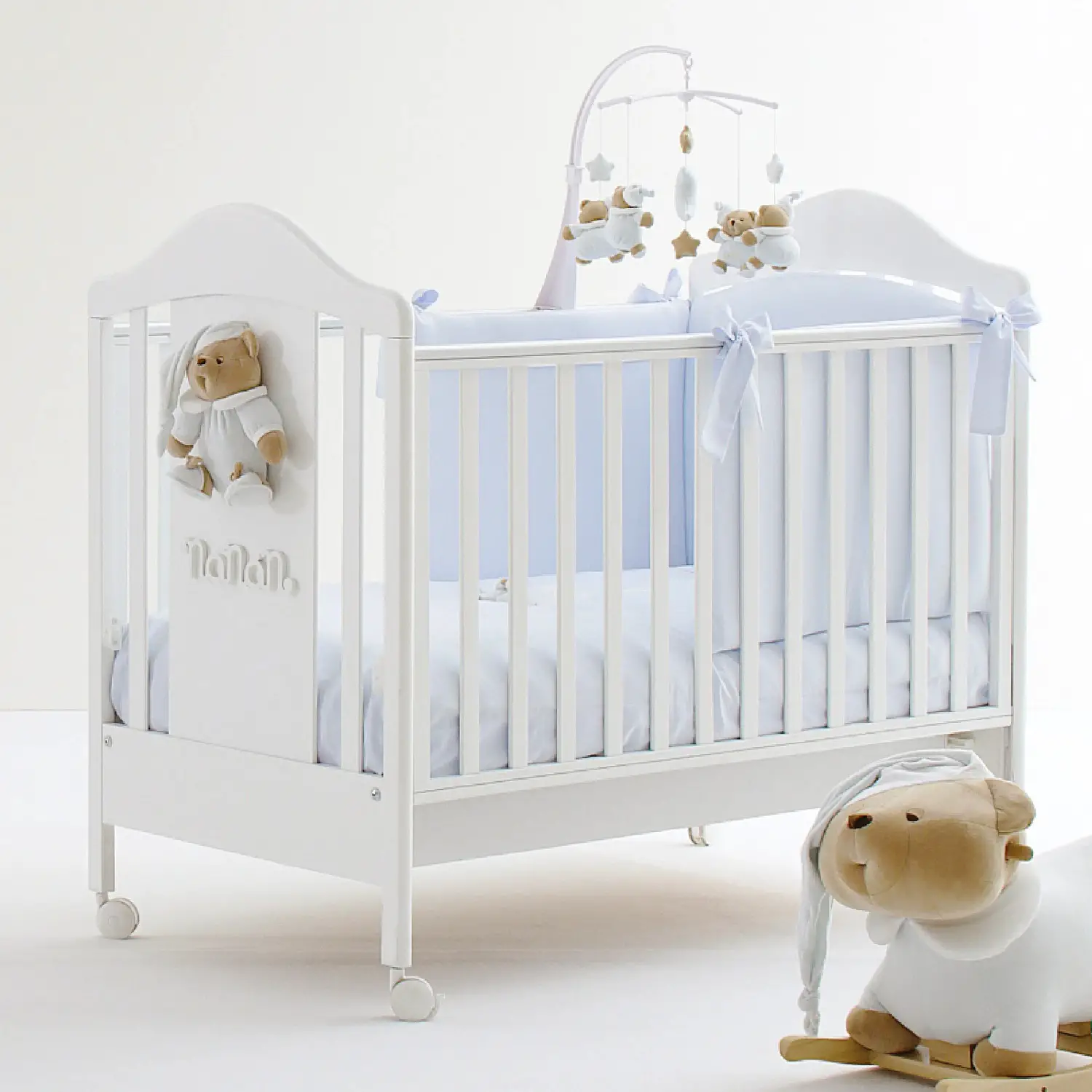 PUCCIO LETTINO BABY BIANCO CON ORSO AZZURRO - collezioni